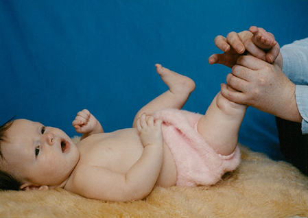 Newborn baby leg massage